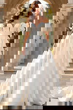 Strapless sweetheart ball gown with off shoulder floral sleeves and full satin skirt.