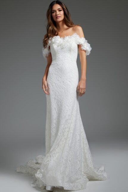 Model wearing JB42295 ivory lace dress with off-shoulder neckline and floral appliqués.