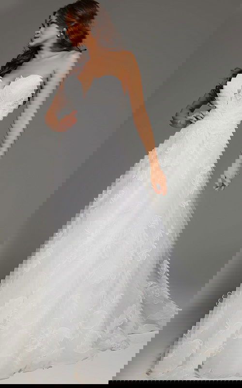 Front view of model wearing Jovani JB42324 ivory gown with floral appliques and sweetheart neckline.