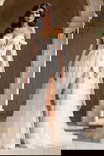 Front view wedding dress with deep illusion neckline and thigh slit tulle overlay