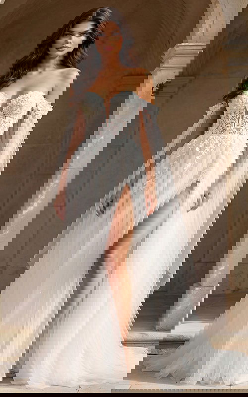 Front view wedding dress with deep illusion neckline and thigh slit tulle overlay