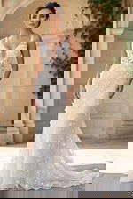 Fit and flare bridal gown with sheer floral bodice