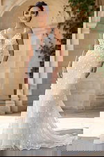 Fit and flare bridal gown with sheer floral bodice