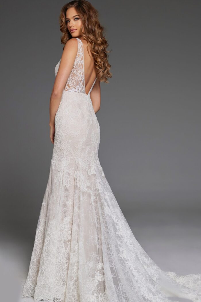 Model wearing Jovani JB43894 ivory lace dress back view