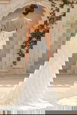 elegant floral lace wedding gown with thin straps and sheer corset bodice