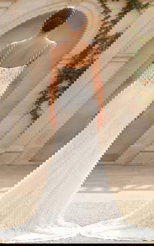 elegant floral lace wedding gown with thin straps and sheer corset bodice