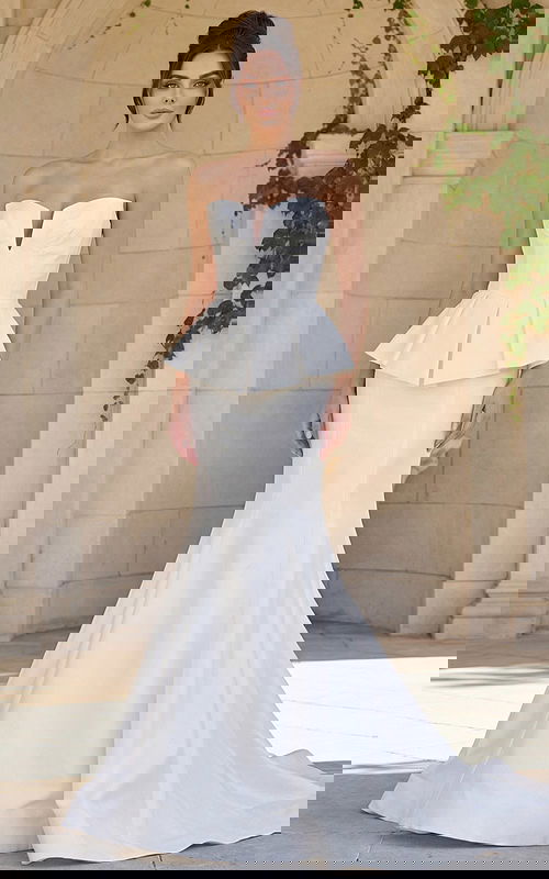 modern strapless wedding gown with structured peplum bodice