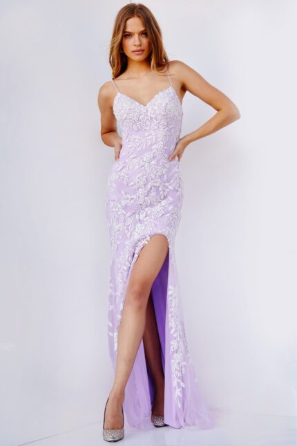 Model wearing Jovani 06660 lilac dress with floral embroidery and high slit.