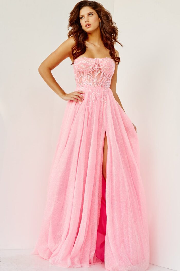 Model wearing Jovani 07434 pink gown with sweetheart neckline and high slit.