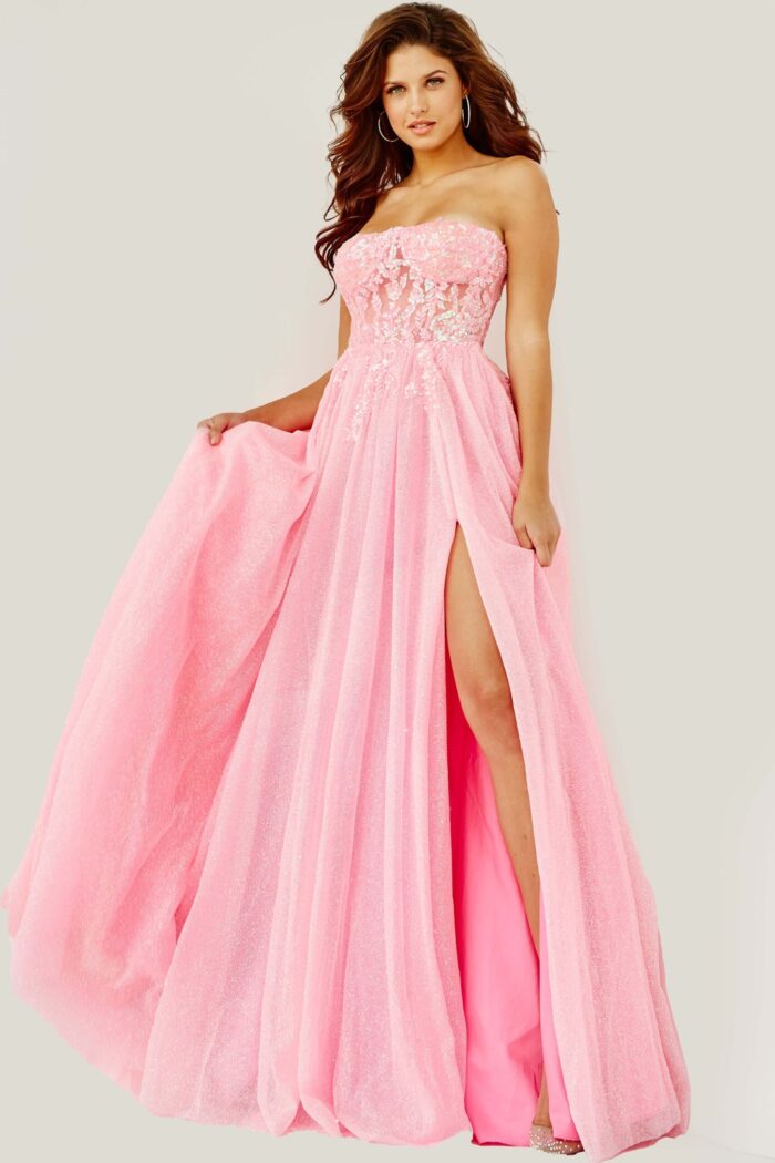 Model showcasing the lace-up back of Jovani 07434 pink gown.
