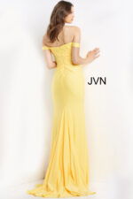 Back view of model in Jovani 07639 yellow gown, displaying elegant fit and off-shoulder style.