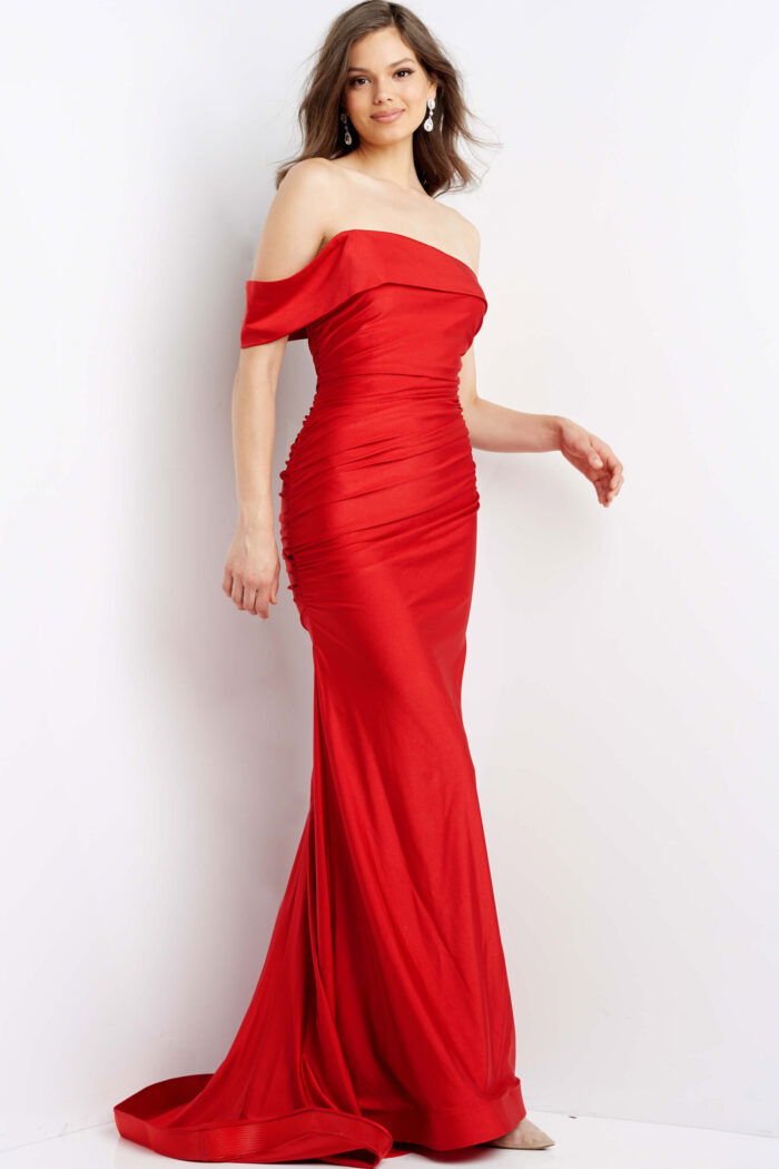 model wearing Jovani 07640 in red with off-the-shoulder neckline and floor-length design