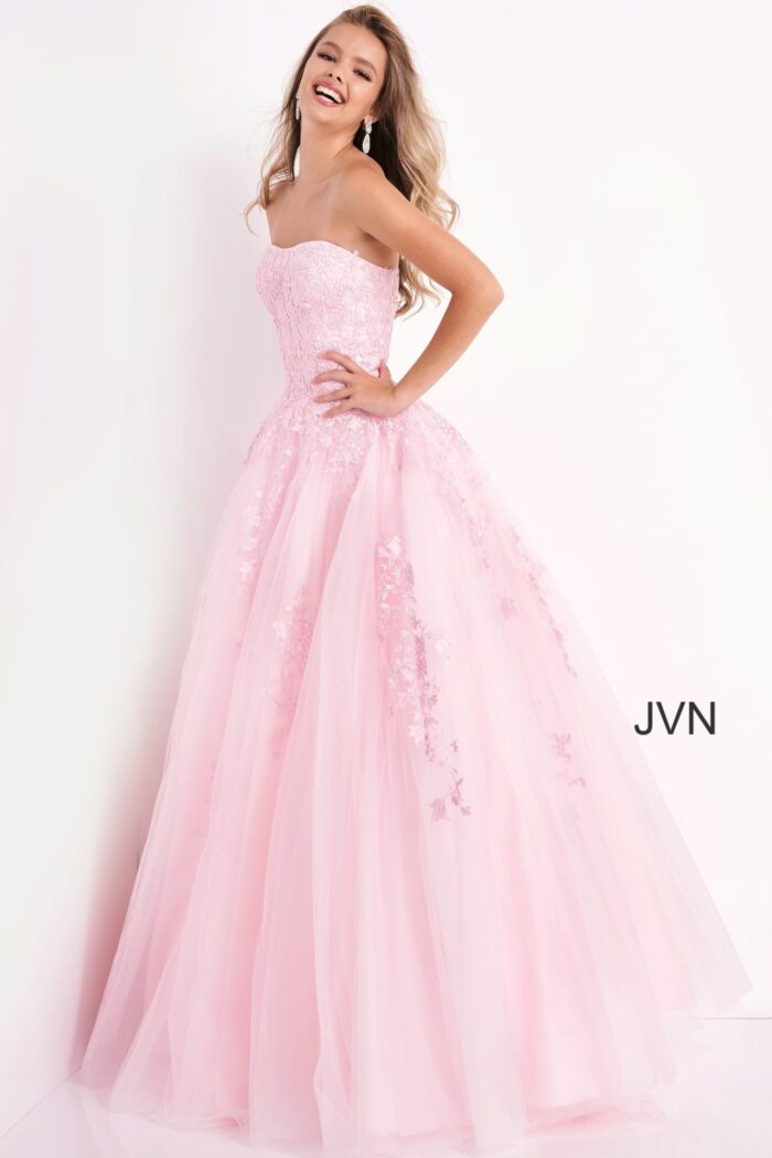 Model wearing Jovani 1831 ball gown in pink, front view