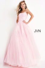 Model wearing Jovani 1831 ball gown in pink, side view