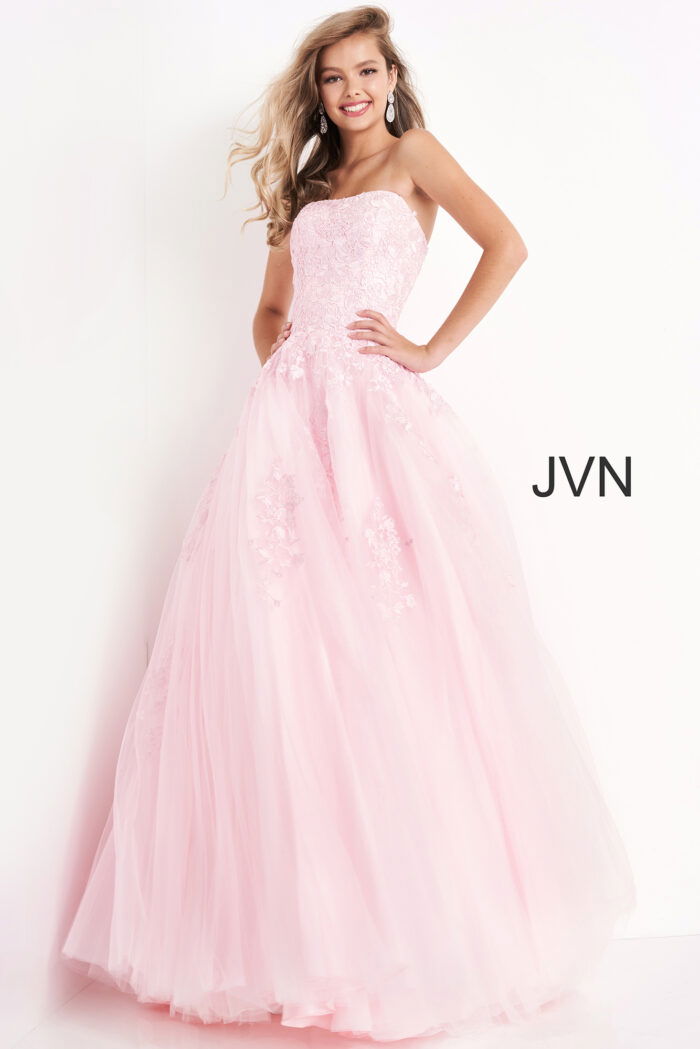 Model wearing Jovani 1831 ball gown in pink, side view