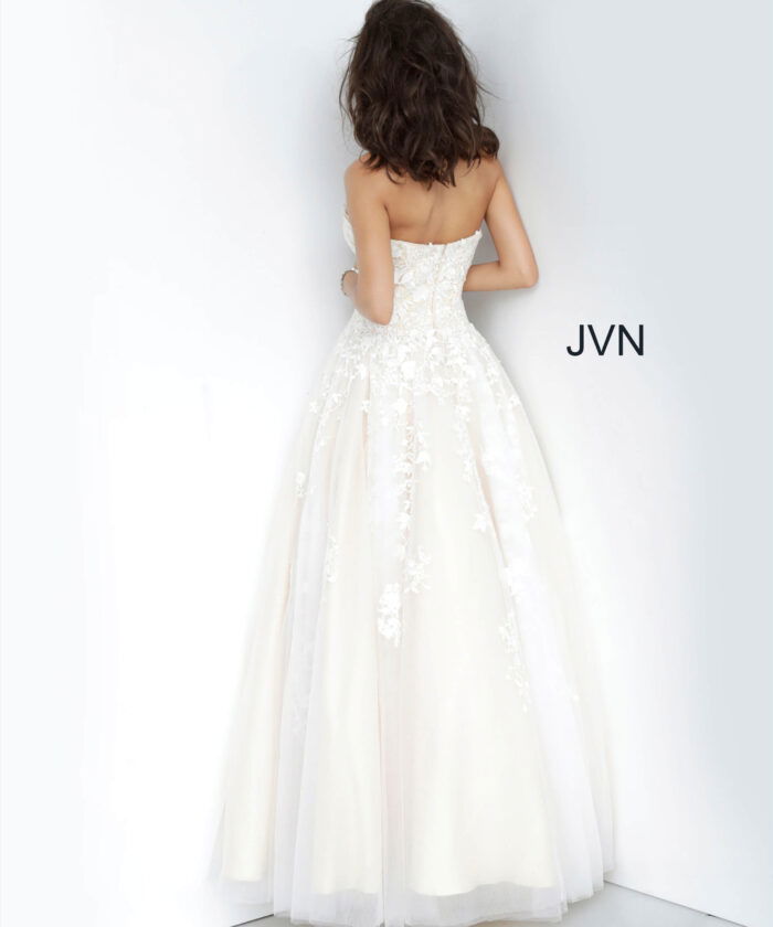 Model wearing Jovani 1831 ball gown in off-white, back view
