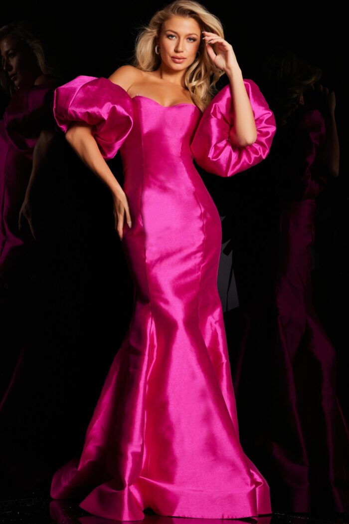 Model wearing Jovani 22830 fuchsia gown with off-the-shoulder puff sleeves.