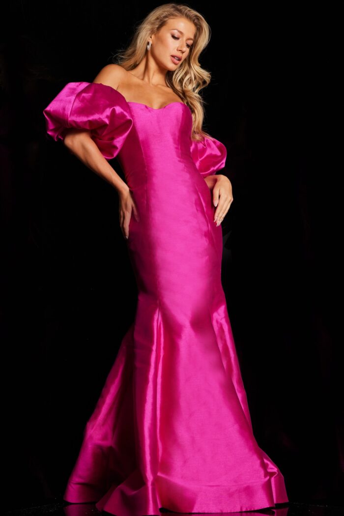 Model showcasing Jovani 22830 fuchsia gown with floor-length silhouette.