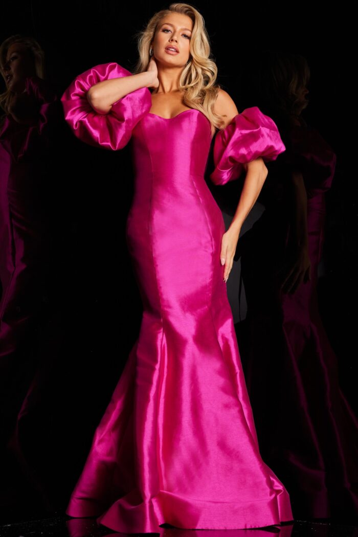Model in Jovani 22830 fuchsia gown with elegant off-the-shoulder puff sleeves.