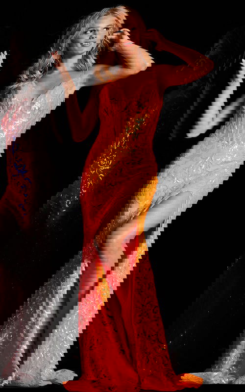 Model wearing Jovani 23216 orange dress with high slit and V-neckline, front view.