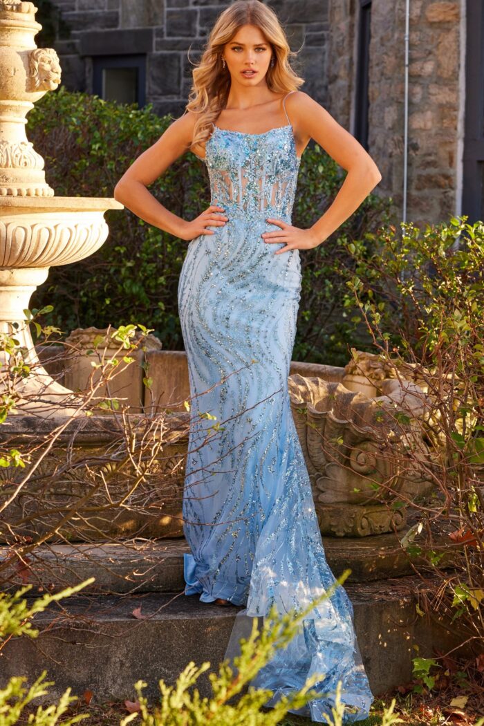 Model wearing Jovani 23250 blue sequined dress.
