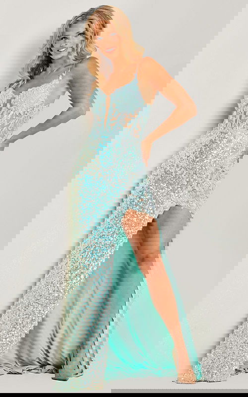 Model wearing Jovani 24299 blue gown with sequins and high slit, front view