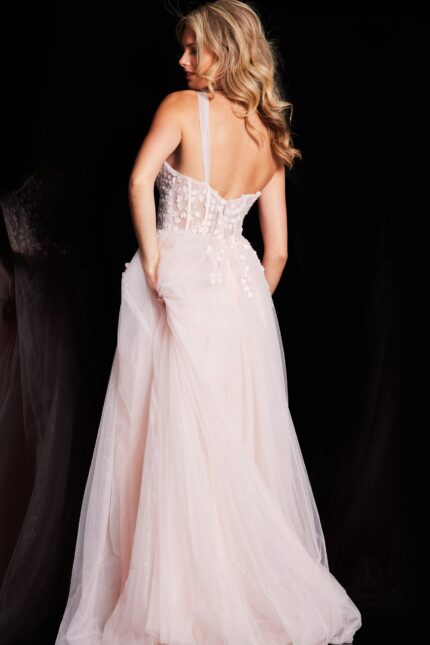 Model wearing Jovani 25913 pink dress, back view showing the flowy train.