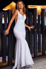 Model wearing Jovani 25914 ivory beaded mermaid gown front view.