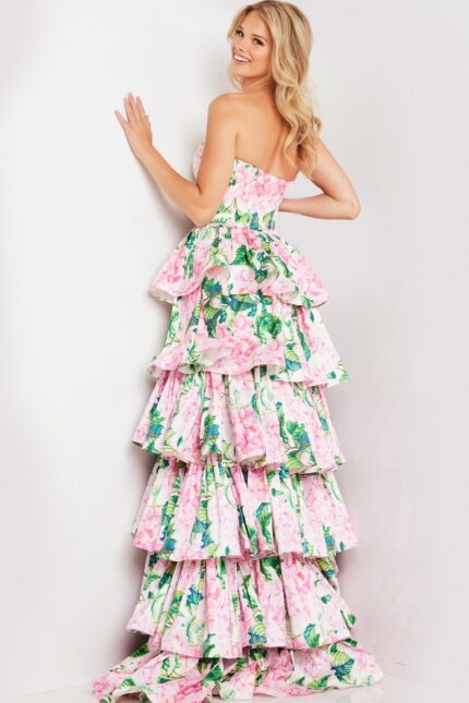 Model in Jovani 37058 dress, back view showing floral ruffle layers