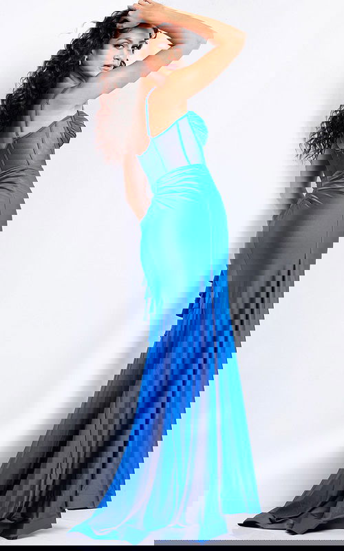 Model wearing 38193 royal gown showing back view and flowing skirt.