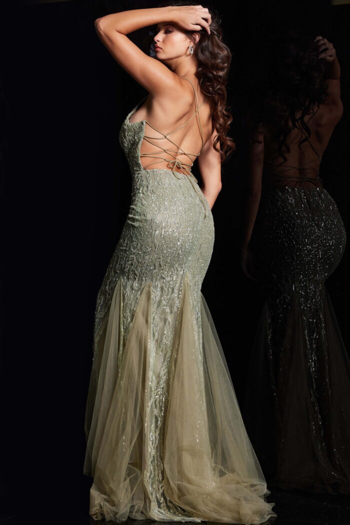 Back view of Jovani 39292 green gown showing open back design with lacing