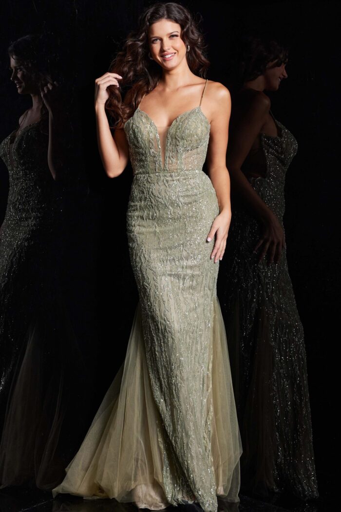 Person in Jovani 39292 green dress with plunging neckline and shimmering details