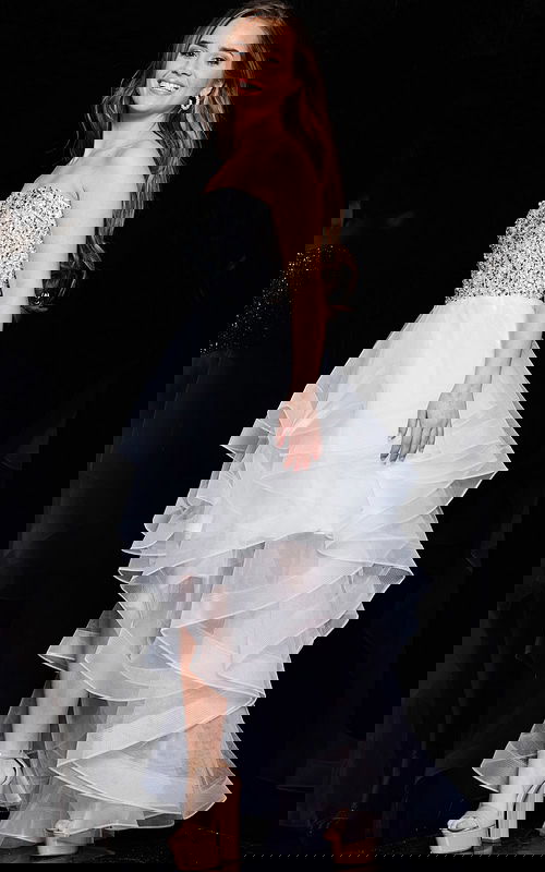 Model wearing Jovani K05916, a white high-low dress with a sequin bodice, main front view.