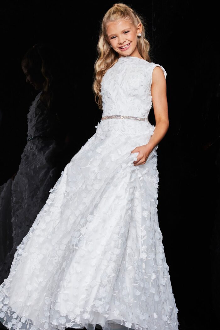 Model in Jovani K07245 ivory gown showcasing a high round neckline and floral design.