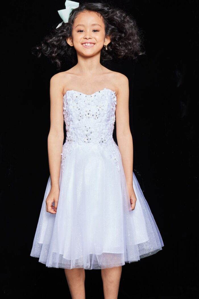 Front view of Jovani K07817 dress in white, modeled by a child.