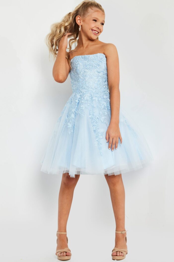 model wearing K1830 blue dress with floral lace design, front view