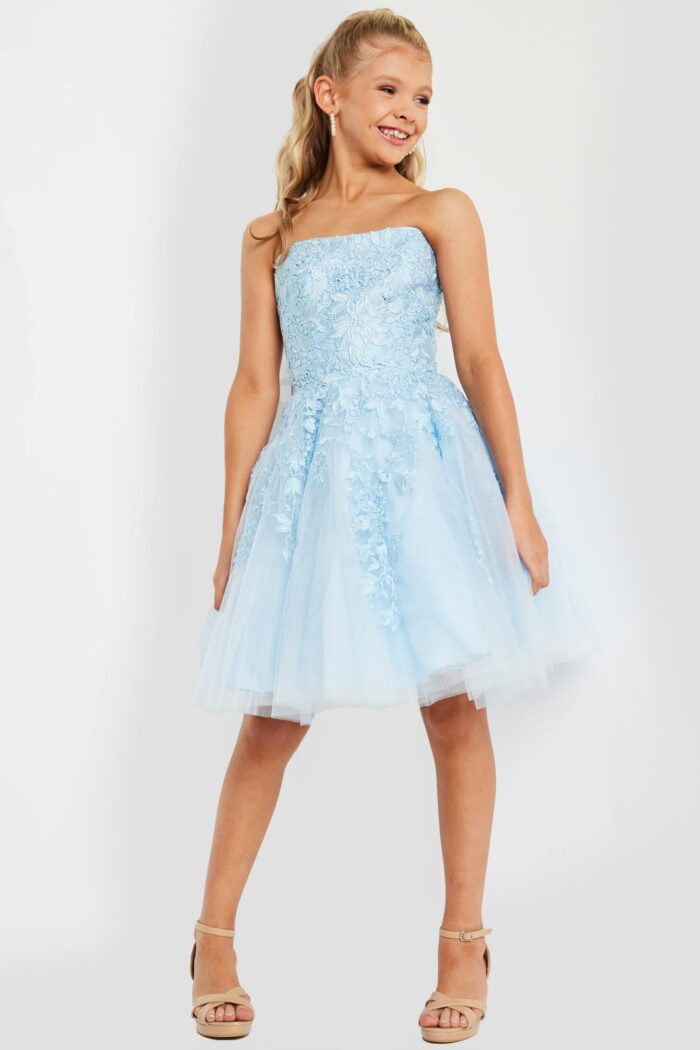 model wearing K1830 blue dress with floral lace design, front view