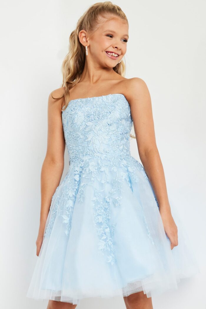 model wearing K1830 blue dress with floral lace design, front view