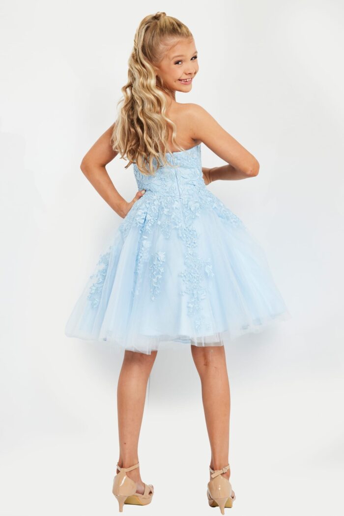 model wearing K1830 blue dress with floral lace design, front view