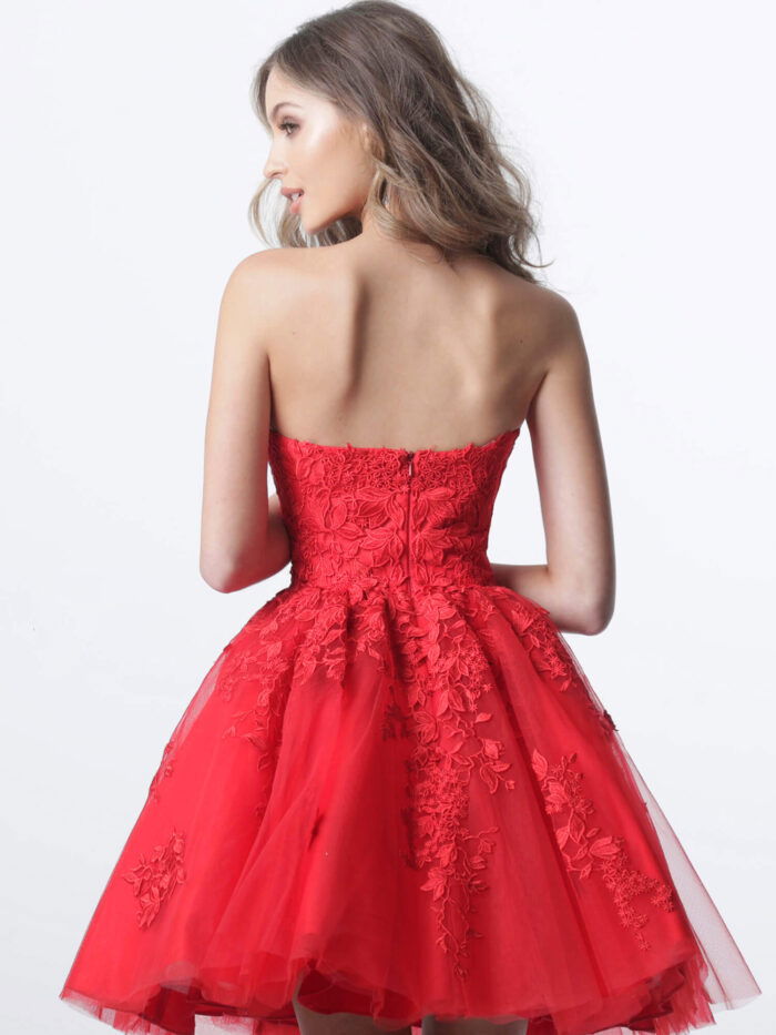 model wearing K1830 red dress with floral lace design, back view