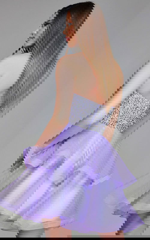 Model wearing Jovani K23666 lilac dress, back view showing sequined bodice.