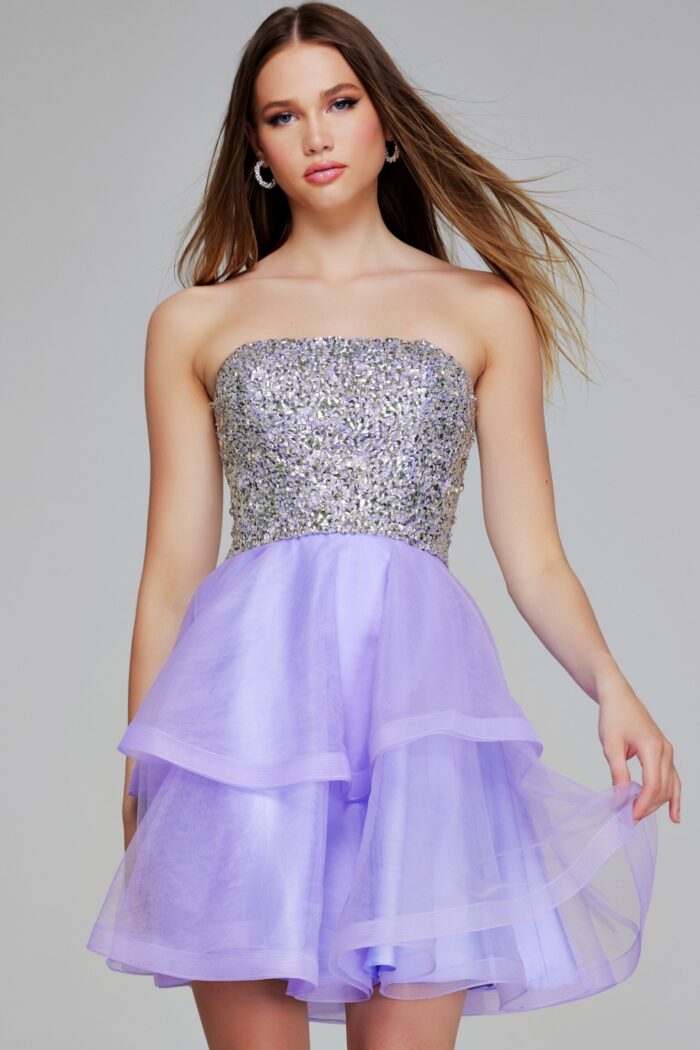 Model wearing Jovani K23666 lilac dress with layered tulle skirt, front view.