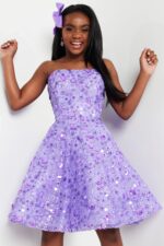 Model wearing Jovani K23685 lilac dress with floral sequins, front view