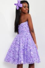 Model wearing Jovani K23685 lilac dress showing lace-up back detail