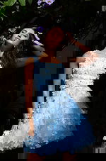 Jovani K38259 light blue sleeveless short A line dress with 3D floral appliques, scattered crystal accents, beaded waistband, and tulle flare skirt