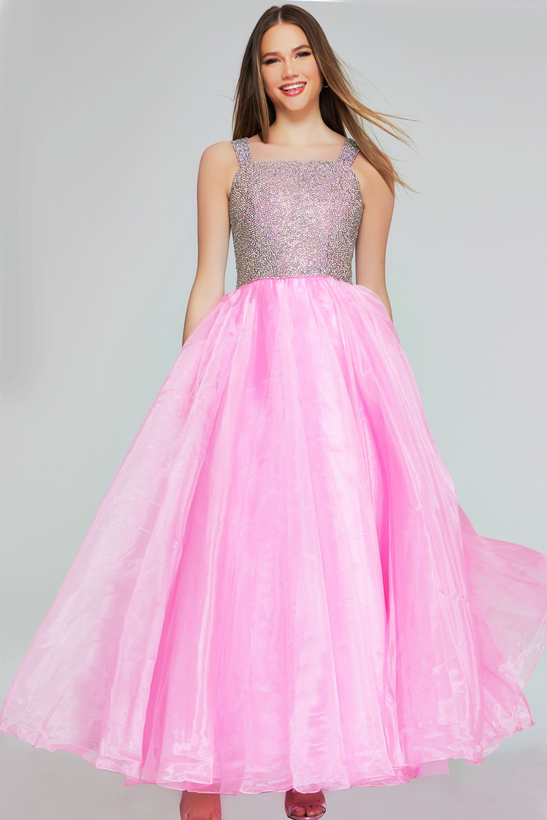 K38261-HOTPINK-204.jpg Model wearing Jovani K38261 pink dress with embellished bodice, front view.