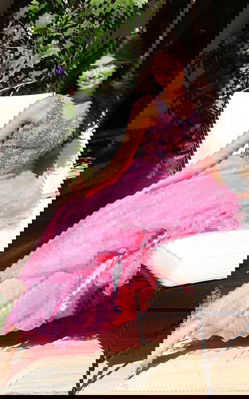 Jovani K39018 hot pink V neck ball gown with crystal beaded floral bodice and ruffled organza layered skirt