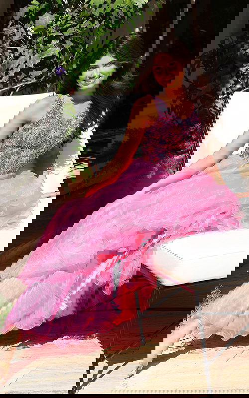 Jovani K39018 hot pink V neck ball gown with crystal beaded floral bodice and ruffled organza layered skirt