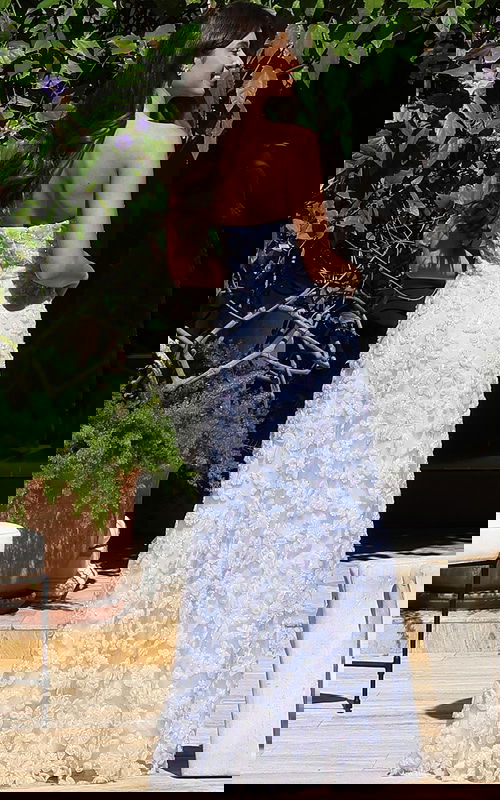 Jovani K42175 blue strapless A line prom dress back view featuring 3D floral lace appliques with sequin accents throughout the full length skirt