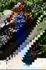 Fitted embellished pantsuit with flowing side cape